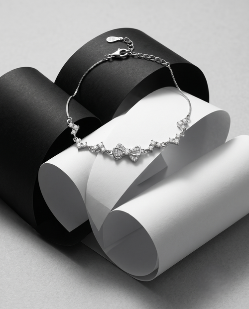 Load image 1 in gallery view. Sterling Silver Bow Bracelet