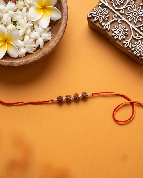Load image 1 in gallery view. THE QUAD RUDRAKSHA RAKHI