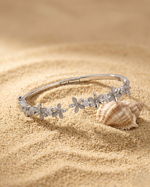 Load image 1 in gallery view. The Petite Flora Solitaire Bangle