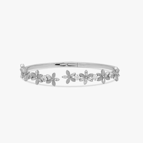Load image 1 in gallery view. The Petite Flora Solitaire Bangle