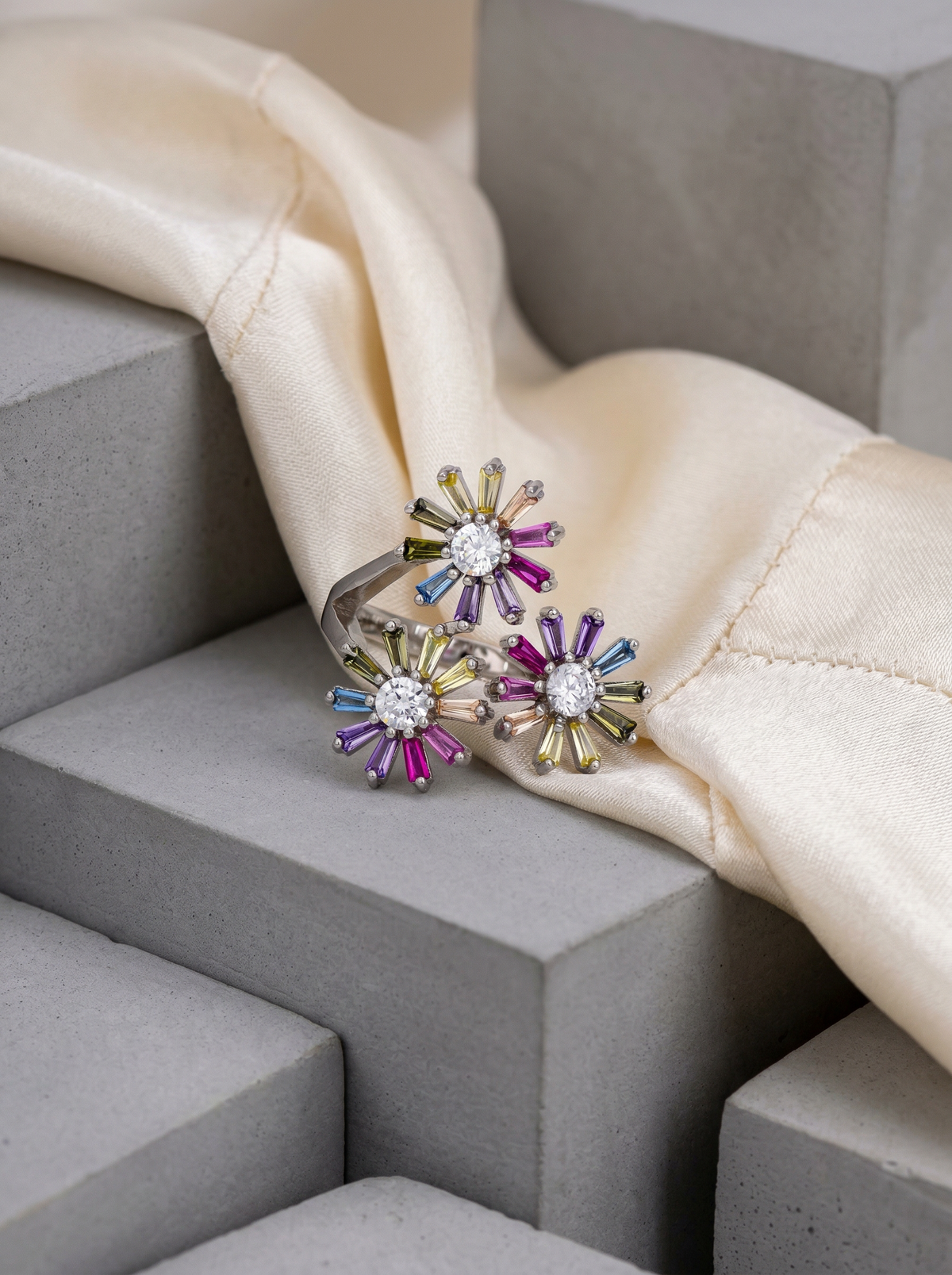 The Triple Floral Multicolor Ring on cream satin
