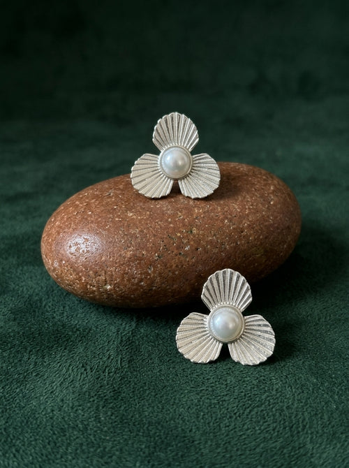 Load image 1 in gallery view. The Radiant Petal Studs
