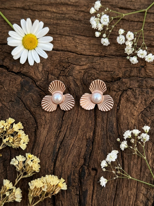 Load image 1 in gallery view. The Radiant Petal Studs